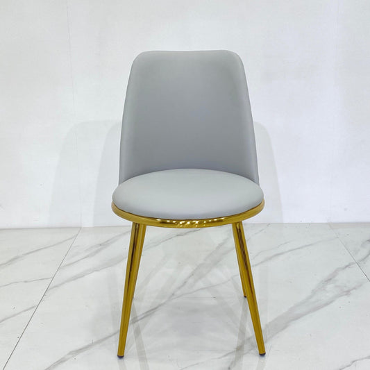 Dining Chair in light gray color with golden legs